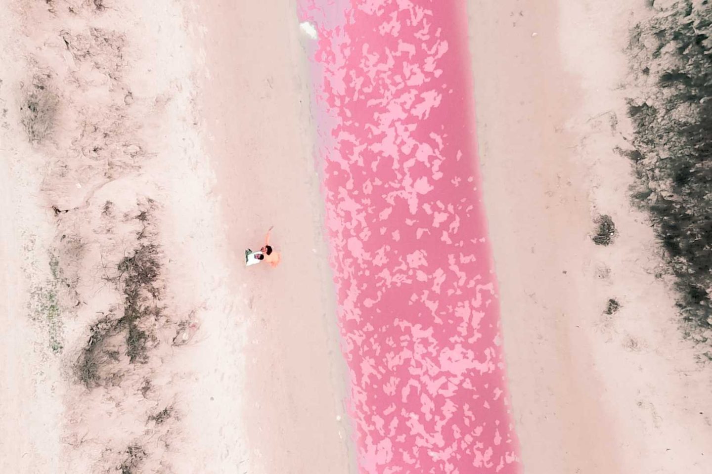 drone shot of pink lake in los coloradas mexico