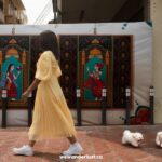 woman walking on street in bangkok wewanderlust.co