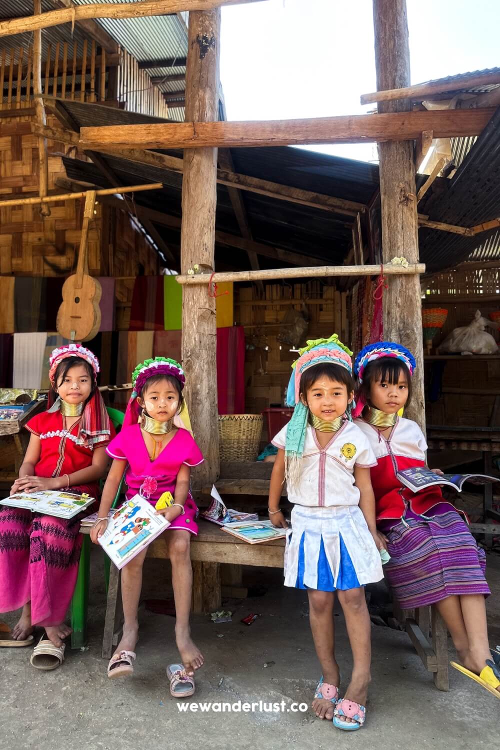 longneck village girls in traditional attire