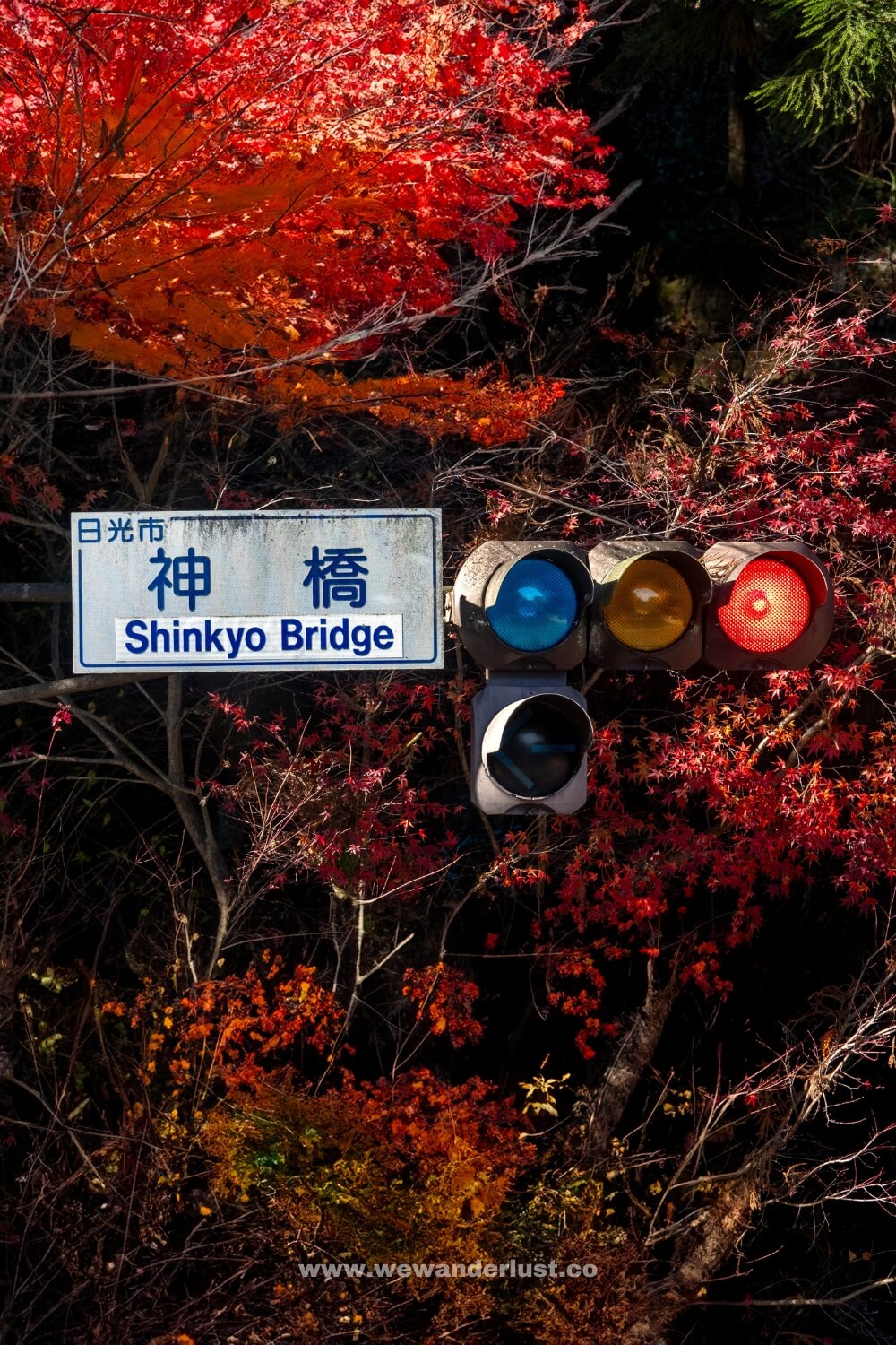 red light by shinkyo bridge in nikko japan