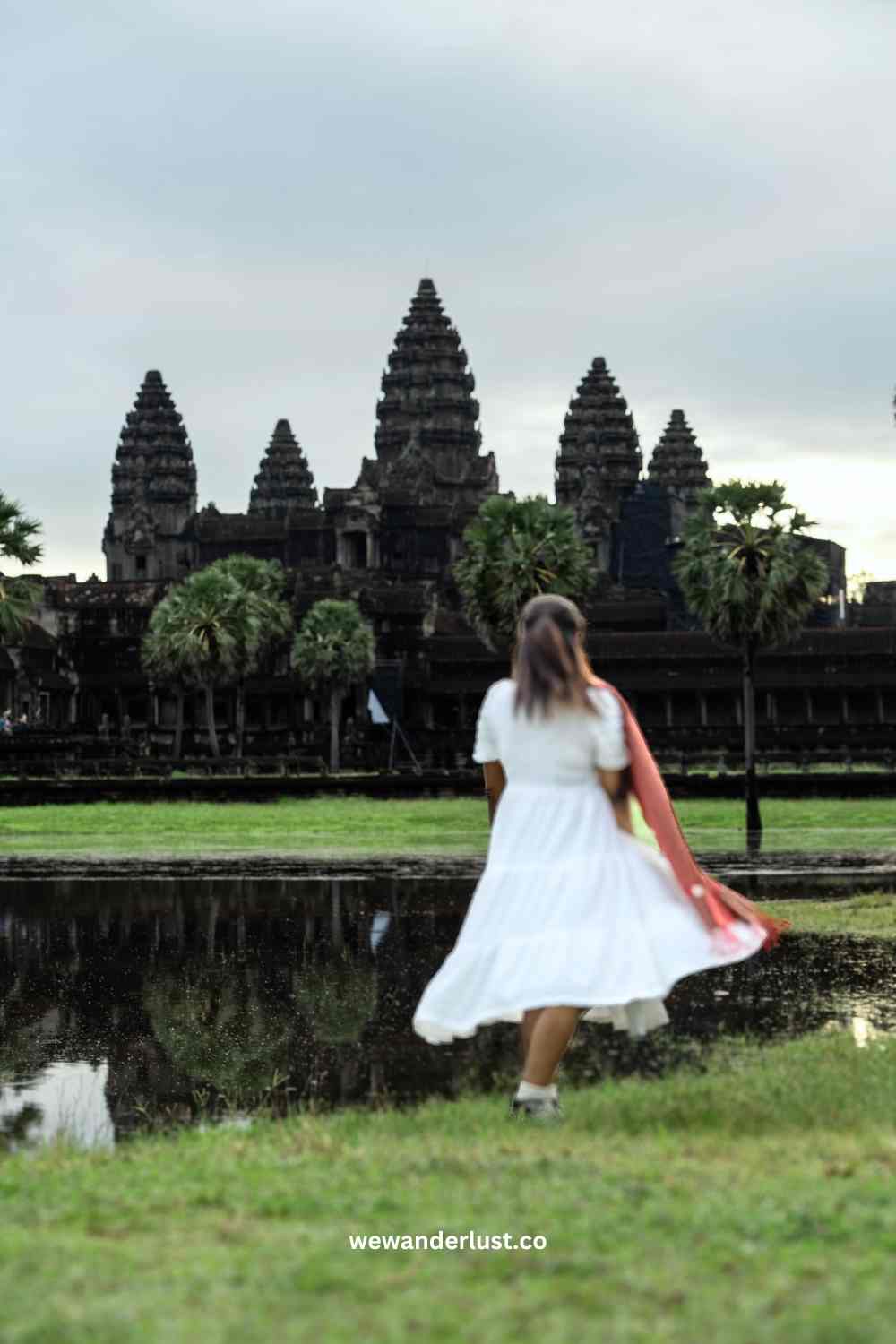 woman standing in front of Angkor Wat Siem Reap Cambodia